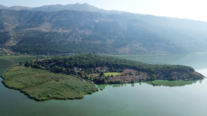 Aerial drone bird's eye view photo of iconic city and castle and mosque of Ioannina surounded by famous lake and mountains of Pindus, Epirus, Greece