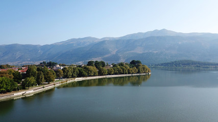 Aerial drone bird's eye view photo of iconic city and castle and mosque of Ioannina surounded by...