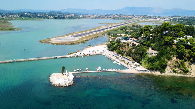 Aerial drone photo of iconic monastery of Panagia Vlacherna in Kanonia area near famous Ponitkonisi, Corfu island, Ionian, Greece