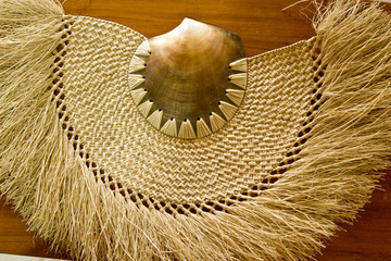 Fiji, Lautoka. Traditional fan made of woven grass and shell.