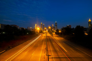 Fototapeta na wymiar Atlanta Skyline Viewed from Jackson St Bridge at Sunrise
