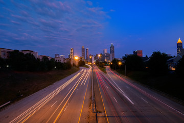 Fototapeta na wymiar Atlanta Skyline Viewed from Jackson St Bridge at Sunrise