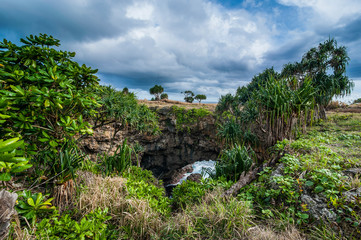 Fototapeta na wymiar Ha'ateiho, big rock arch in Tongatapu, Tonga, South Pacific