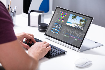 Man Editing The Video On Computer