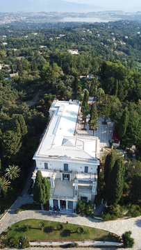 Aerial drone photo of iconic Palace of Achileion former residence Empress Elisabeth of Austria (known as 'Sissi') and Kaiser William II of Germany, Corfu island, Ionian, Greece