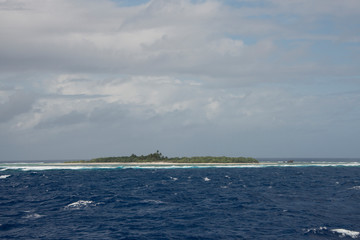 Western Pacific Ocean, Federated States of Micronesia, Caroline Islands, State of Yap. Tiny remote island of Gaferut surrounded by coral reef.