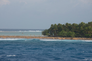 Federated States of Micronesia, Caroline Islands, Yap, Island of Ifalik. Pacific view of tiny reef island of Ifalik.