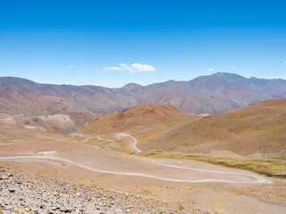 Fototapeta na wymiar Routa 40 climbing up to Abra del Acay (4895m), one of the highest regular roads in the world. The Altiplano in Argentina.