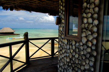 South Pacific, French Polynesia, Moorea, Tiki Village. Coastal Pearl House covered in osyter shells.