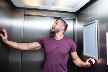 Man Trapped In Elevator © Andrey Popov