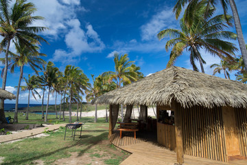 Easter Island aka Rapa Nui, Anakena. Rapa Nui National Park, UNESCO World Heritage Site. View of park facility that includes restrooms and food vendor hut.