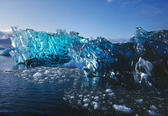 Chile, San Rafael Lagoon NP. An iceberg is birthed from the waters of San Rafael Lagoon NP,...