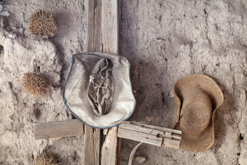 Mexico, Mineral de Pozos. Old hats hang on wall. Credit as: Don Paulson / Jaynes Gallery / DanitaDelimont.com