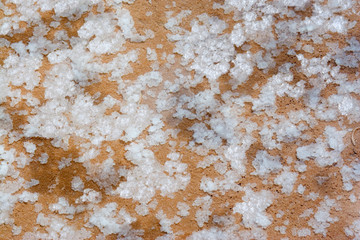 South America - Peru. Closeup of salt ponds near Maras where the salt water evaporates and salt is extracted for sale at markets.