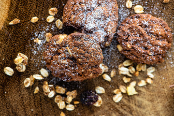 cookies with icing sugar and wood background
