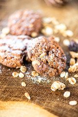 cookies with icing sugar and wood background
