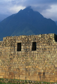 Peru, Machu Picchu, Inca Ruins, Afternoon Light On Stonework.