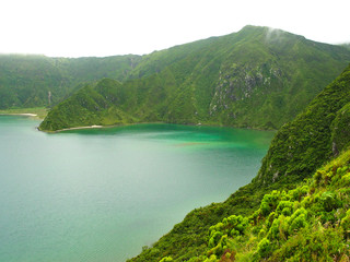 Azure mountain pond in the Azores, Portugal.