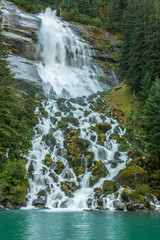 Obraz premium USA, Alaska, Tongass National Forest. Waterfall on cliff face. Credit as: Cathy & Gordon Illg / Jaynes Gallery / DanitaDelimont.com