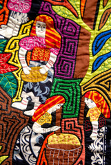 Central America, Panama, San Blas Islands (aka Kuna Yala). Colorful hand stitched mola made by the Kuna Indians, detail of everyday life in fabirc.