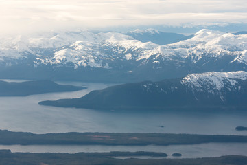 US, Alaska, Aerial view of Coast Range approaching Juneau International Airport. Called 'island city' because no roads access it