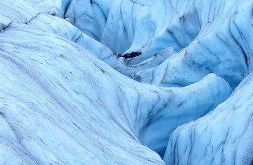 Fototapeta premium Glacier formations as seen while ice hiking on Root Glacier in Alaska
