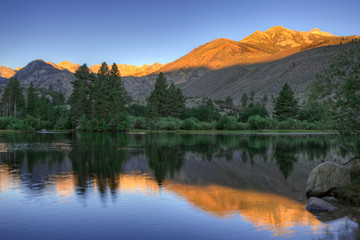 USA, California, Bishop. Sunrise on mountain lake. 