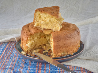 Cup of black tea.And Apple sponge cake.
