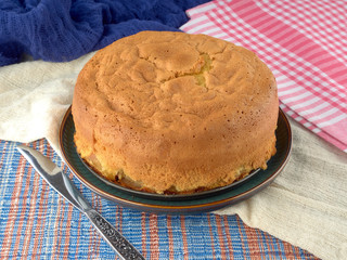 Cup of black tea.And Apple sponge cake.