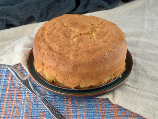 Cup of black tea.And Apple sponge cake.