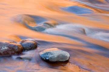 AZ, Arizona, Slide Rock State Park, Oak Creek, water pattern with reflected light from sandstone rock