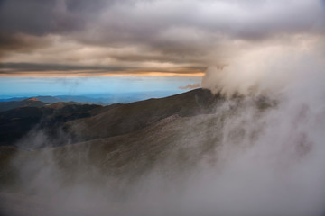 USA, Colorado, Front Range. Storm clouds over mountains. 