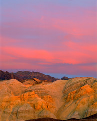 USA, California, Death Valley NP. Sunset offers a variety of colors both in the sky and the sand at Zabriskie Point, Death Valley NP, California.