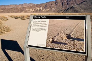 USA, California, Death Valley National Park. National Park Service Information sign discussing The Racetrack Playa phenomenon.