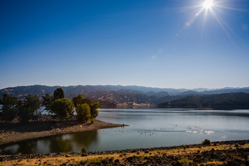 A landscape scene on Lake Mendocino during a triathlon event