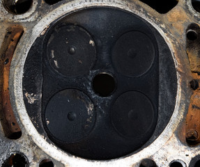 Valve in a deposit on the removed cover of the engine valve box.