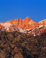USA, California, Mt Whitney. Sunrise colors the rocks pink at Mt Whitney, California.