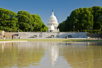 USA, Washington, D.C. The US Capital Building with the capital fountain and relfecting pool.