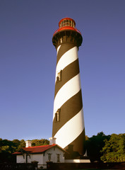 A coastal lighthouse stands guard over historic St. Augustine, FL, America's oldest city.