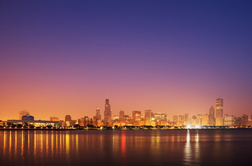 USA, Illinois, Chicago. Sunset skyline and Lake Michigan. 