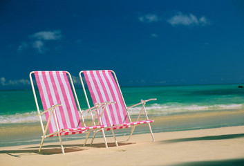 USA, Hawaii. Beach chairs