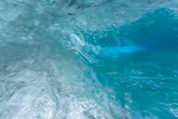 Naklejka premium Fisheye view of wave breaks at Kua Beach, North of Kona, Big Island, Hawaii