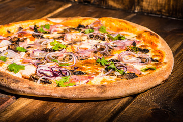 Fresh pizza made in a small bakery