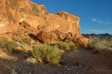 USA, Nevada. Valley of Fire State Park. Sandstone cliffs above a wash