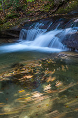 Fall leaves in Basin Cascade, New Hampshire