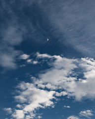 A small moon visible in the daytime
