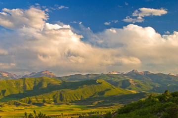USA, Colorado, Aspen, Old Snowmass Valley. Summer sunset on green mountain vista. 