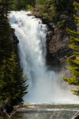 Fototapeta na wymiar Trick Falls Hiding Behind Red Eagle Falls, Glacier National Park