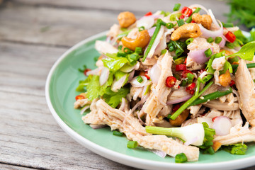 Steamed rip chicken spicy salad with shallot, celery, chili and Scallion.