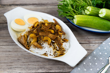Thai Rice Vermicelli with Kaeng Pung (Tai) Pla Nam Khon (Fish Kidney Thick Spicy Soup).